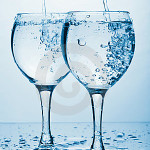 pure-water-splashing-two-glasses-6969632